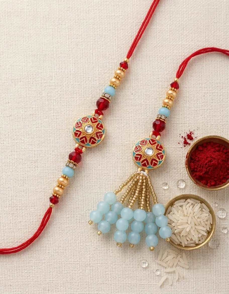 Decorative beads on red strings with small bowls of vermillion and rice on a beige background