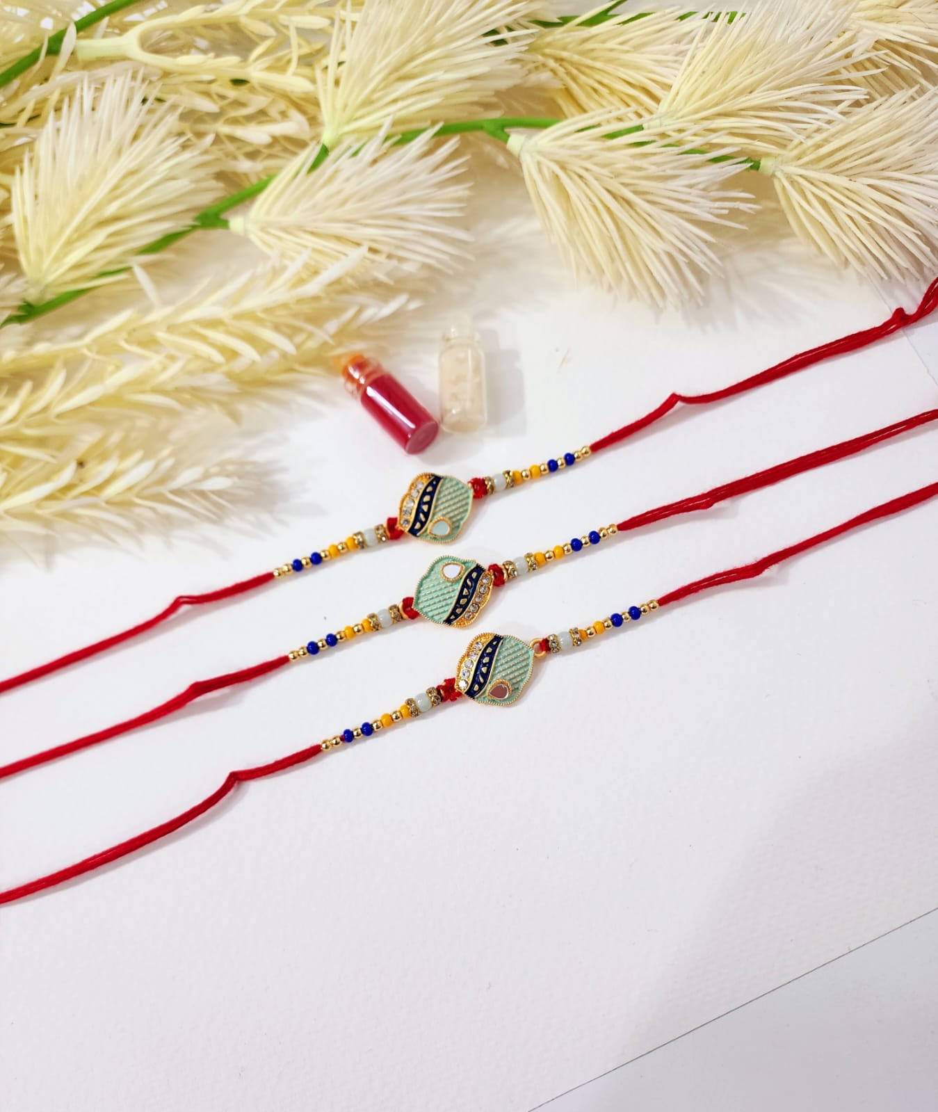 HOK Beautiful Shell Shape Rakhi- 2pc Set