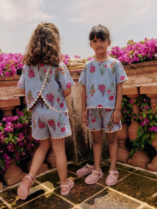 Girls cotton co-ord set with floral print and stripe pattern, front and back view, breathable summer outfit with lace detail and split back design
