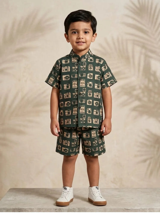 boys green cotton co-ord set with camera print front view half sleeve shirt and shorts