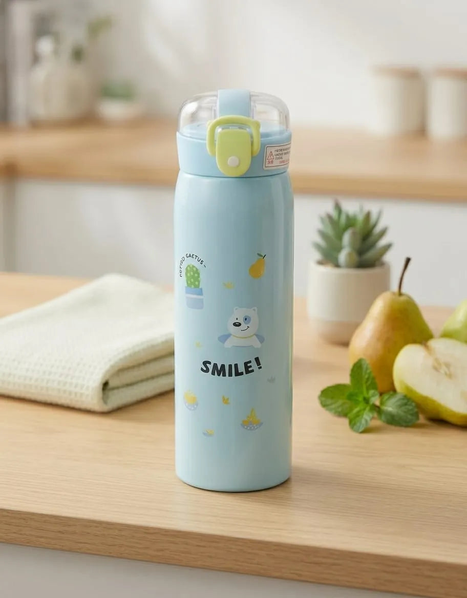 Light blue water bottle with smiley face design on a wooden surface