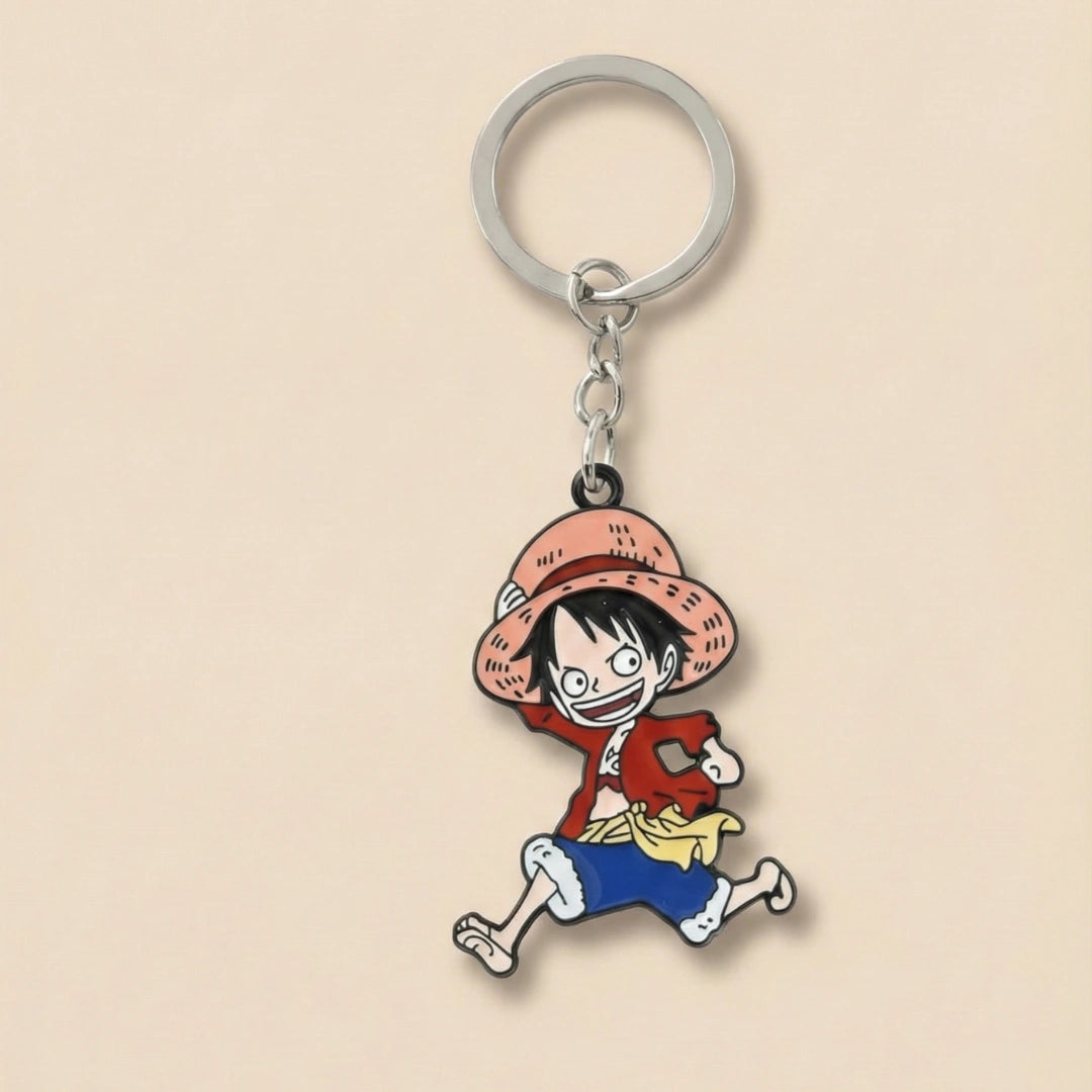Keychain with a cartoon character in a red jacket and straw hat on a beige background