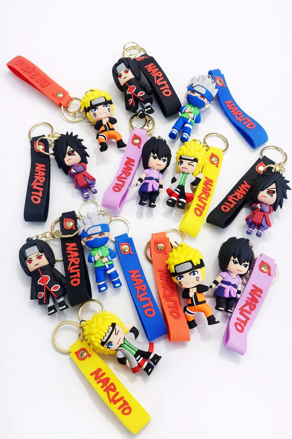 Collection of Naruto-themed keychains on a white background