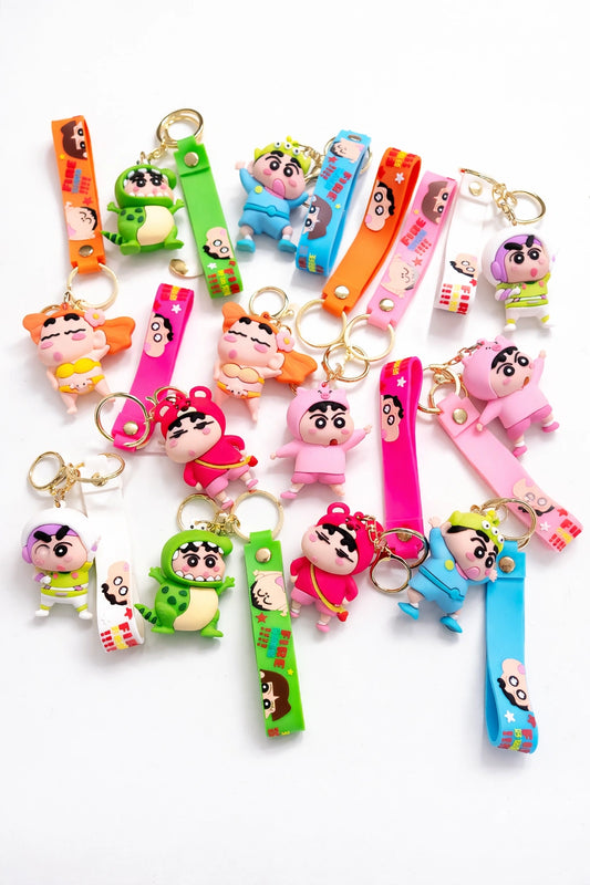 Collection of colorful cartoon character keychains on a white background