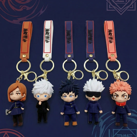 Set of five anime character keychains on a dark blue background