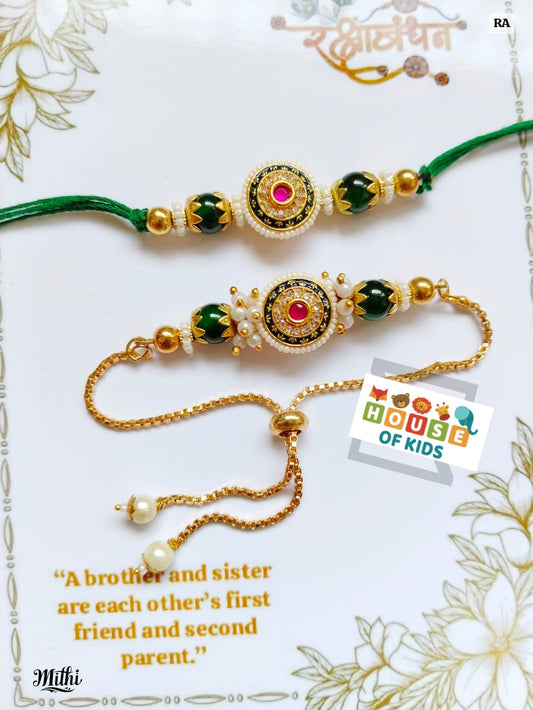 Two decorative rakhi with gold and green design on a white background with floral patterns.