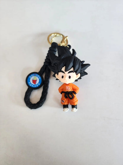 Keychain with character figure and logo on a light gray background