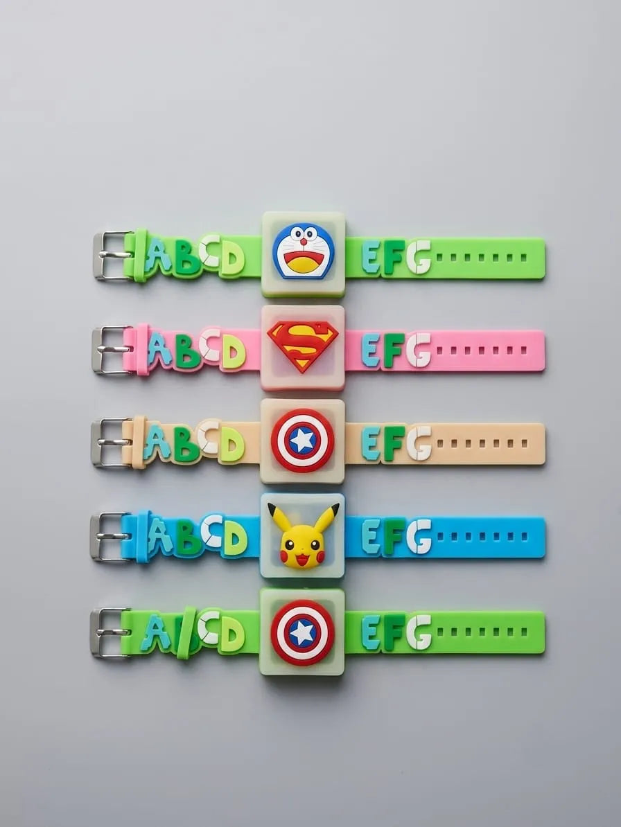 Six colorful silicone watch bands arranged vertically on a light gray background, each with a square character face charm in the center and letters across the strap.