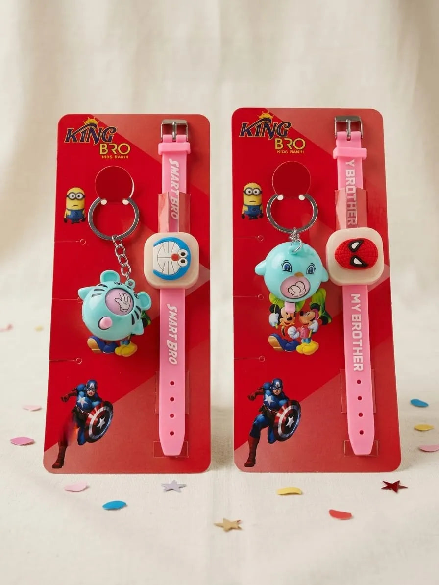 Two pink silicone wristwatches with keychains displayed on red backing cards. The left watch features a blue cartoon character charm and a light blue dial with 'SMART BROTHER' text.