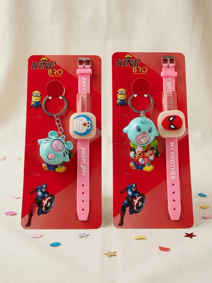 Two pink silicone wristwatches with keychains displayed on red backing cards. The left watch features a blue cartoon character charm and a light blue dial with 'SMART BROTHER' text.