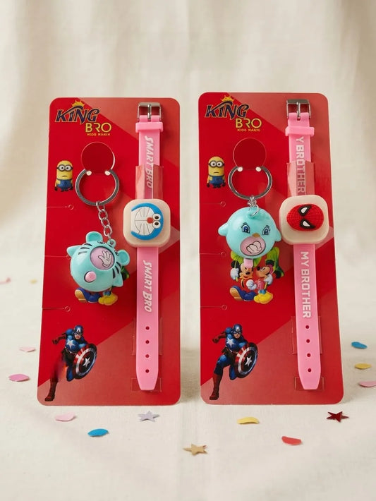 Two pink silicone wristwatches with keychains displayed on red backing cards. The left watch features a blue cartoon character charm and a light blue dial with 'SMART BROTHER' text.