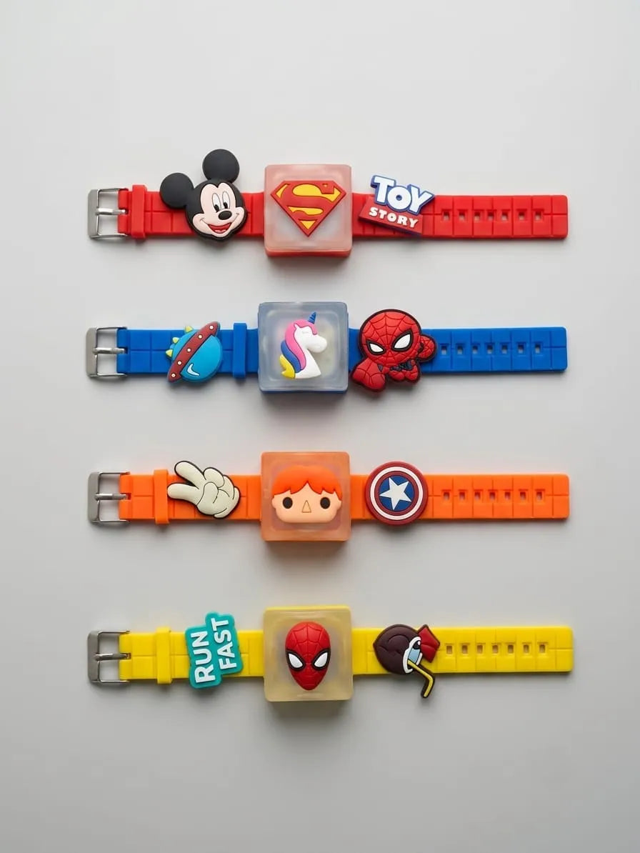 Four colorful silicone watch straps laid out horizontally on a light gray background, each with a character or logo charm in the center and a metal buckle on the left. The straps are red, blue, orange, and yellow, featuring Mickey Mouse, Superman, Toy Story, a space-themed charm, Spider-Man, a peace sign, a cartoon face, Captain America, a 'Run Fast' charm, and Spider-Man again.