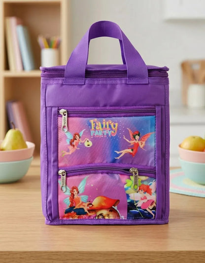 Purple lunch bag with fairy design on a wooden table
