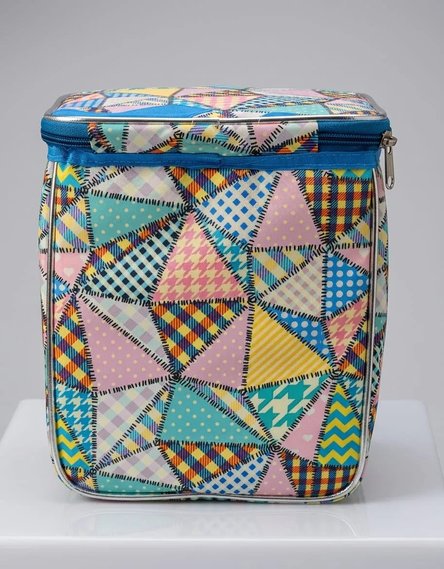 Colorful geometric patterned bag on a gray background