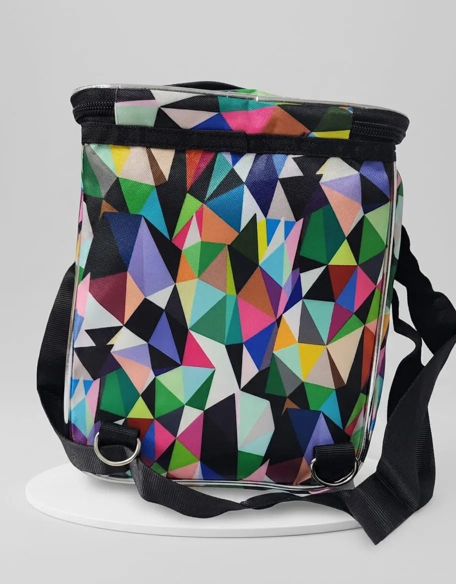 Colorful geometric-patterned backpack on a white background