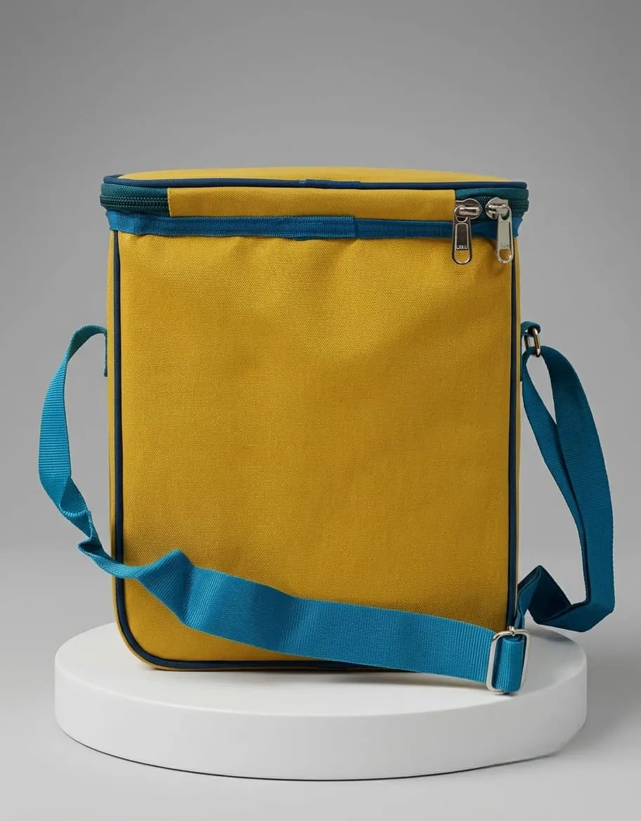 Yellow bag with blue straps on a gray background