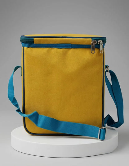 Yellow bag with blue straps on a gray background