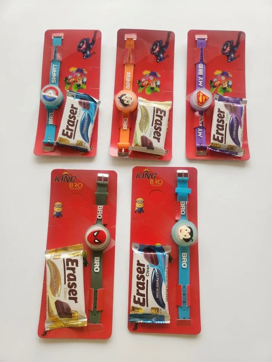 Five packaged kids' novelty watches with colorful wrist straps and round character faces, each attached to a red backing card with an Eraser candy and a small chocolate bar. The cards show superhero-style characters including Spider-Man, Superman, and Minions.