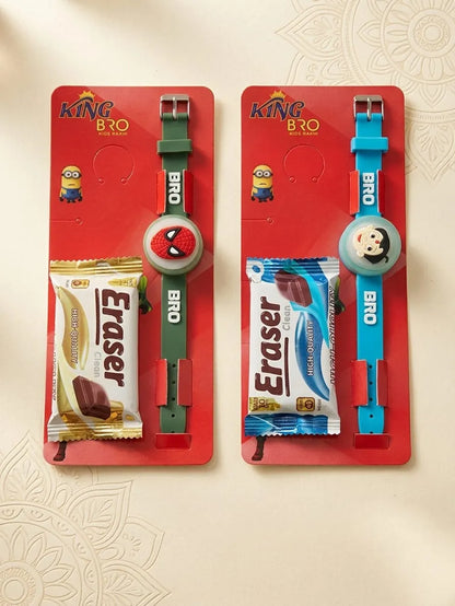 Two King Bro watch gift sets on red backing cards, each featuring a wristwatch and a packaged Eraser chocolate bar. One set has a green watch with a Spider-Man-themed dial, and the other has a blue watch with a cartoon character dial.