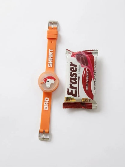 An orange silicone watch with a circular dial featuring a cartoon horse and the words 'SMART BRO' printed on the strap, shown next to a wrapped Eraser High Quality eraser on a white background.