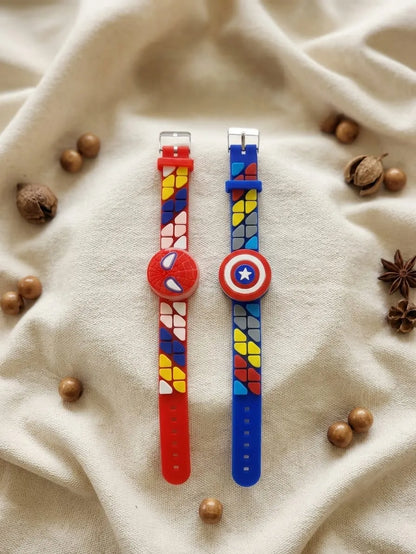 Two kids' silicone watch bands with Marvel character designs, displayed on a beige fabric background with decorative wooden beads and star anise. One band features Spider-Man with a red dial, and the other features Captain America with a blue dial.