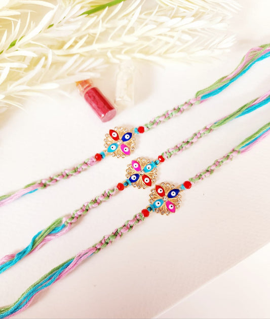 Decorative bracelets with colorful beads on a light background