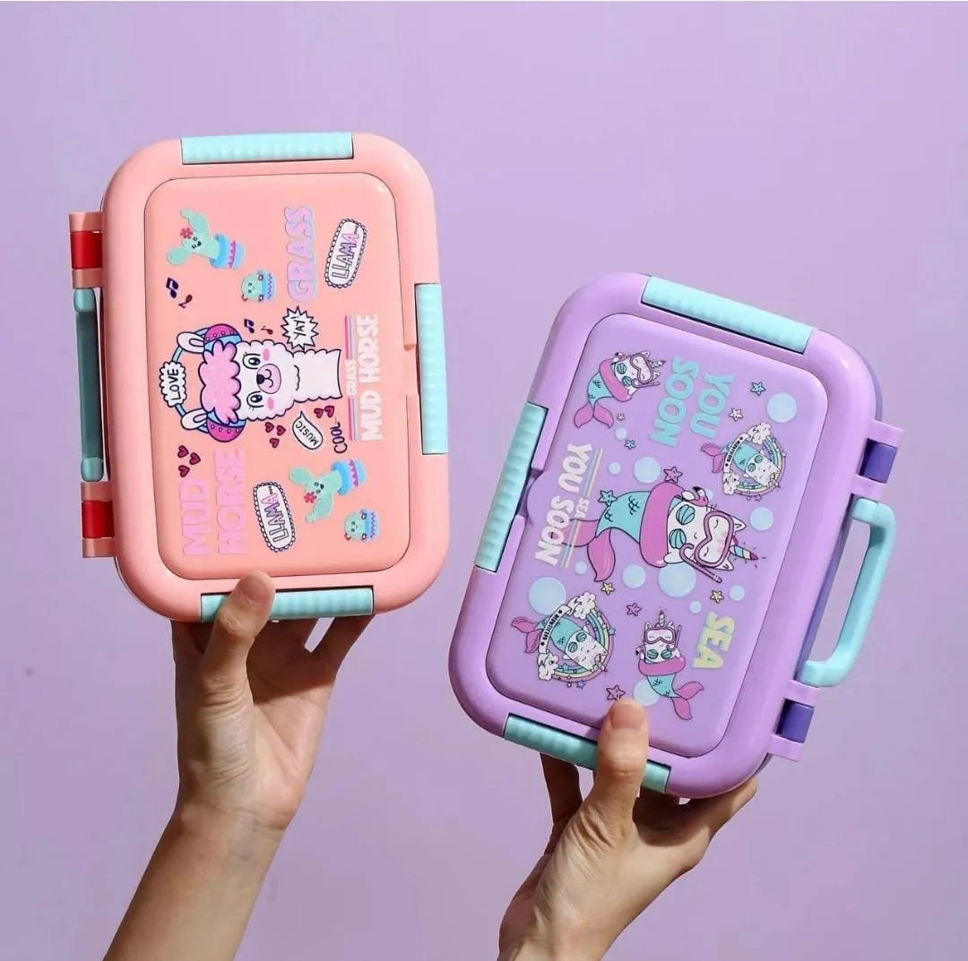 Two colorful lunch boxes held against a purple background