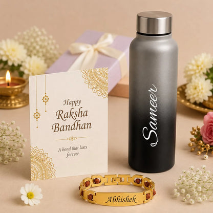 A personalized Raksha Bandhan gift set featuring a gold-plated bracelet engraved with 'Abhishek', a matte black-to-silver gradient water bottle engraved with 'Sameer', a cream-colored greeting card with gold mandala designs and 'Happy Raksha Bandhan' text, and a light purple gift box tied with a white ribbon, all styled with flowers and a lit candle on a beige surface.