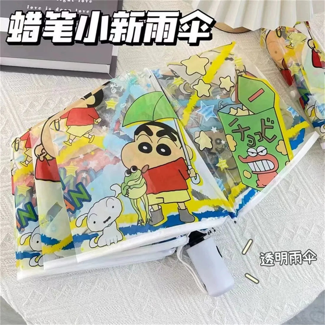 Colorful cartoon-themed umbrella with character design on a white background
