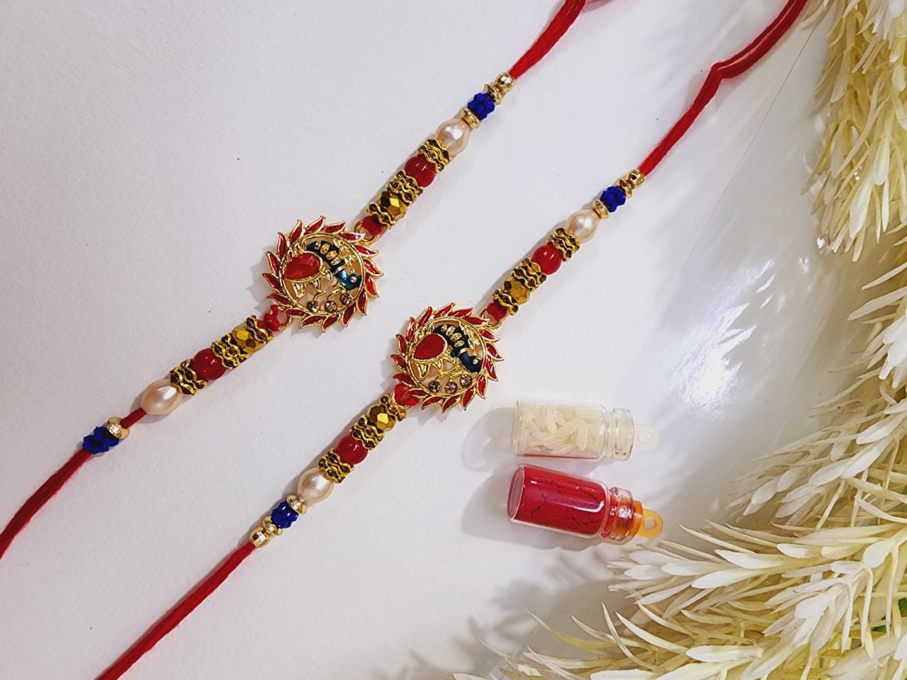 HOK Peacock/Flower Rakhi