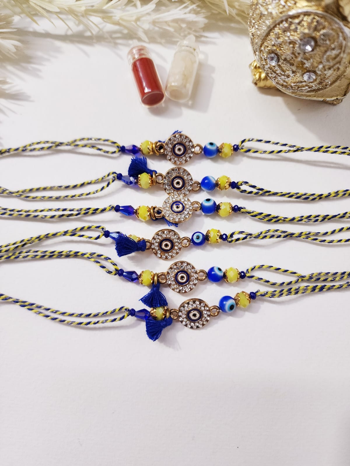 HOK Beautiful Evil Eye Blue-Yellow Rakhi