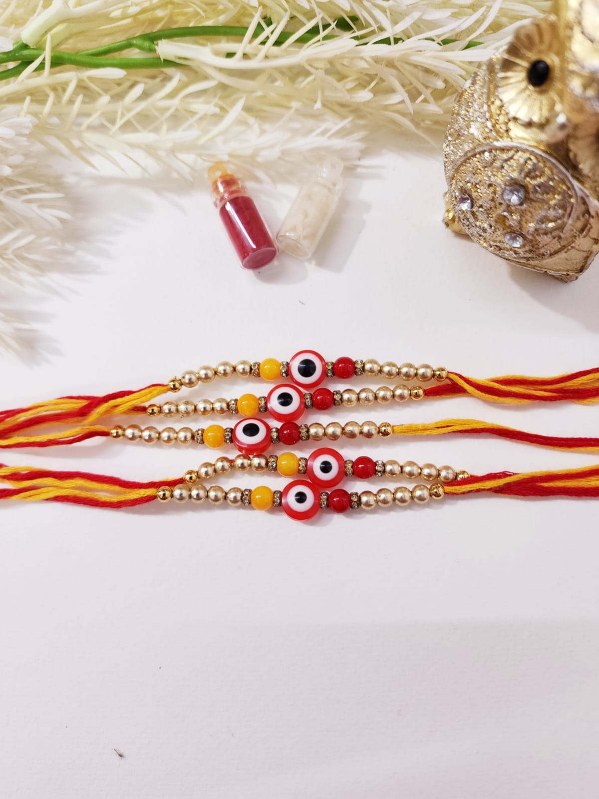 HOK Red-Golden Evil Eye Rakhi