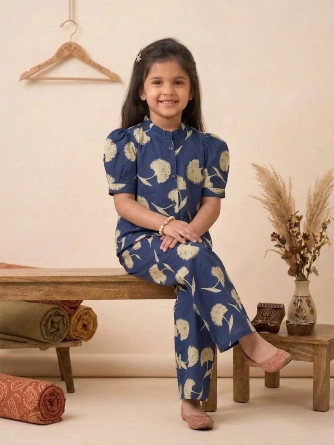 Kids blue printed coord set sitting pose comfortable outfit