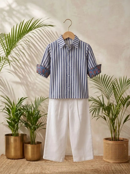 Boys casual blue striped cotton shirt with white trousers front view
