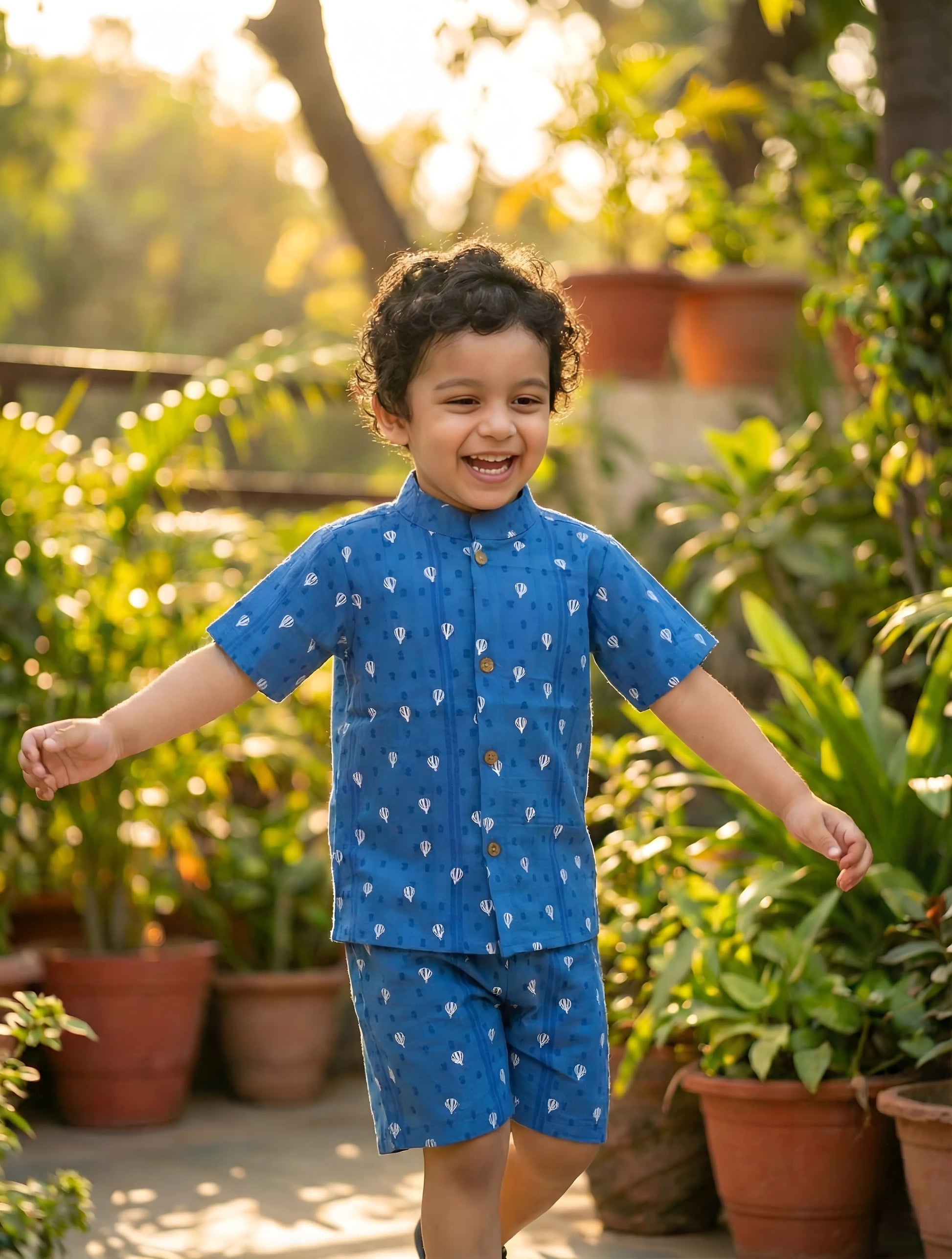 Boys royal blue printed cotton shirt and shorts set