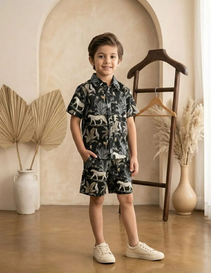 Boys black printed shirt and shorts set front view stylish summer outfit