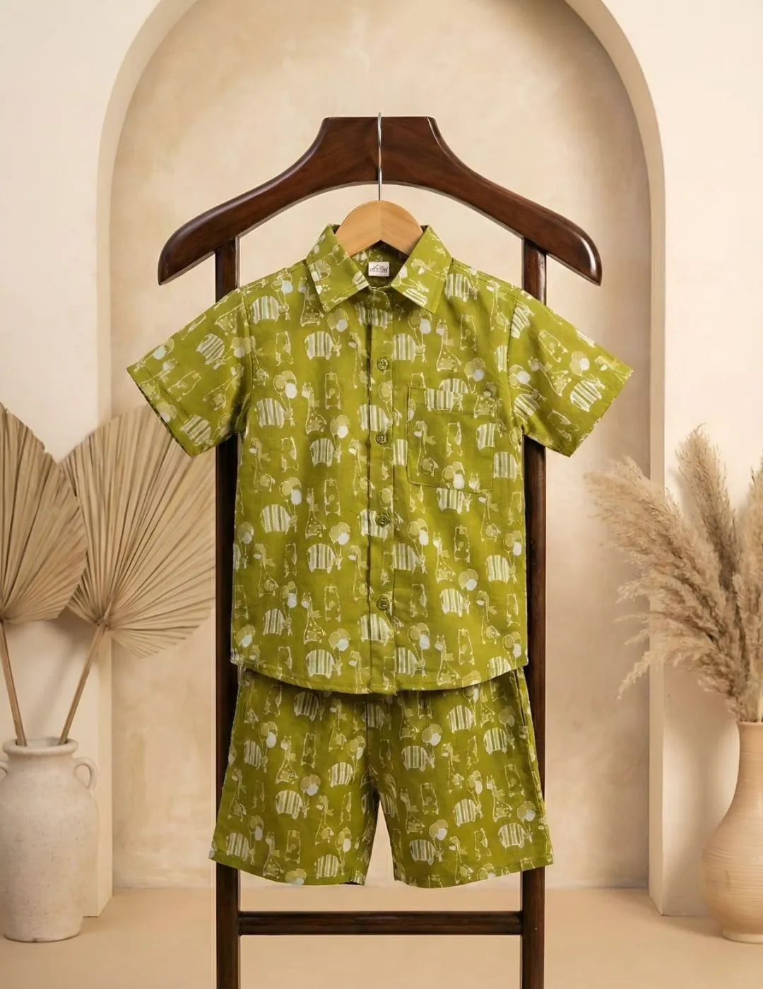 Boys olive printed shirt and shorts stylish front look