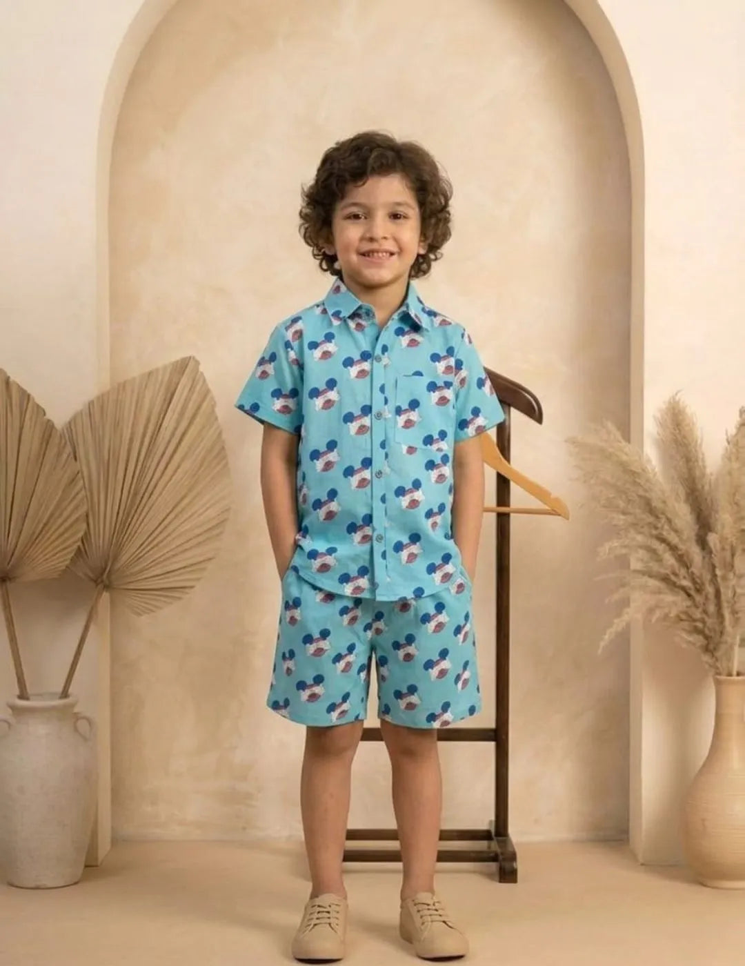 Boys sky blue printed shirt and shorts set front view