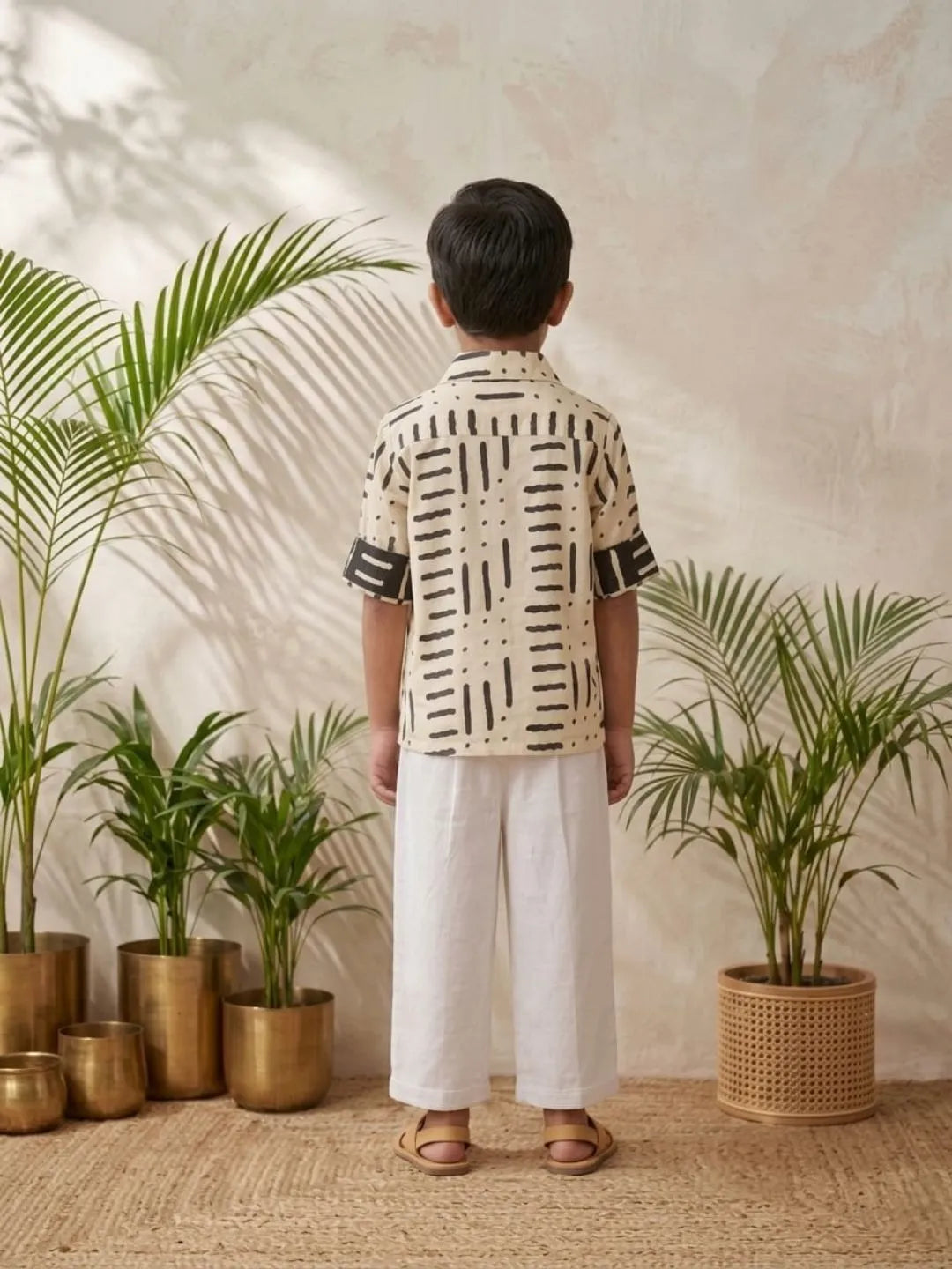 Boys white printed cotton shirt and white trouser co-ord set back view