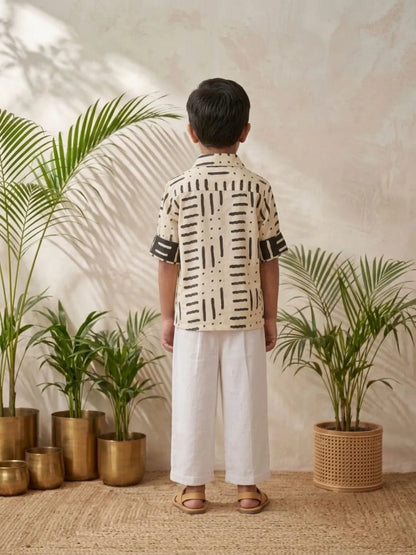 Boys white printed cotton shirt and white trouser co-ord set back view