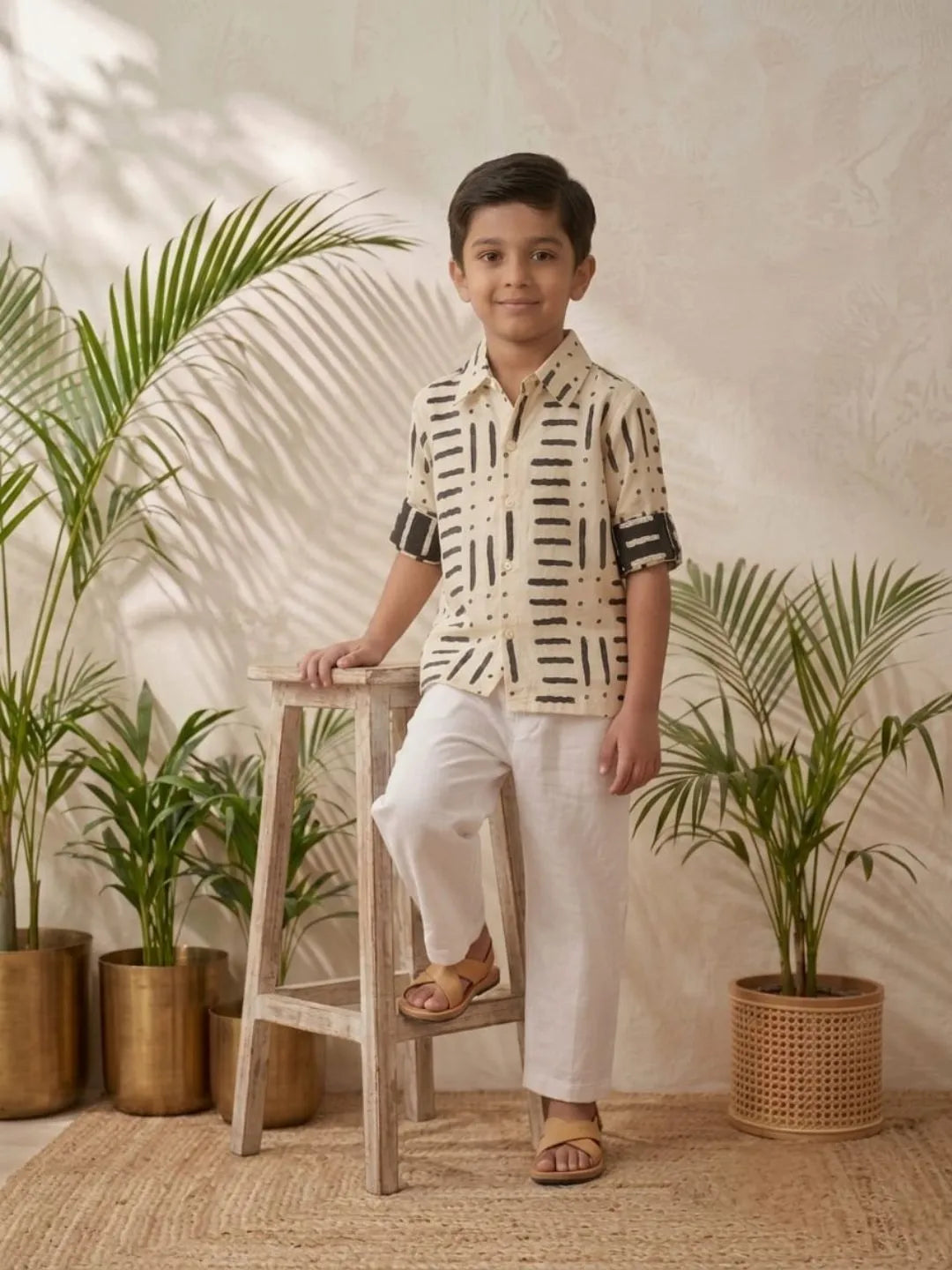 Kids white abstract print cotton shirt and white pants outfit front angle