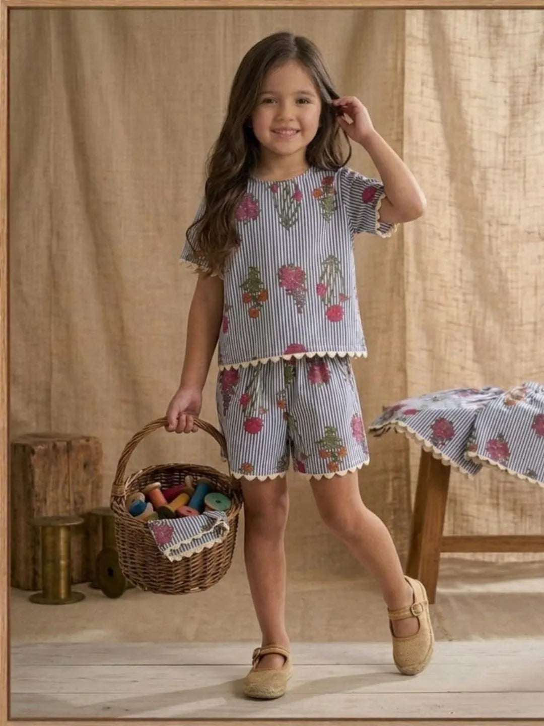 Girls blue floral stripe cotton co-ord set front view with printed design