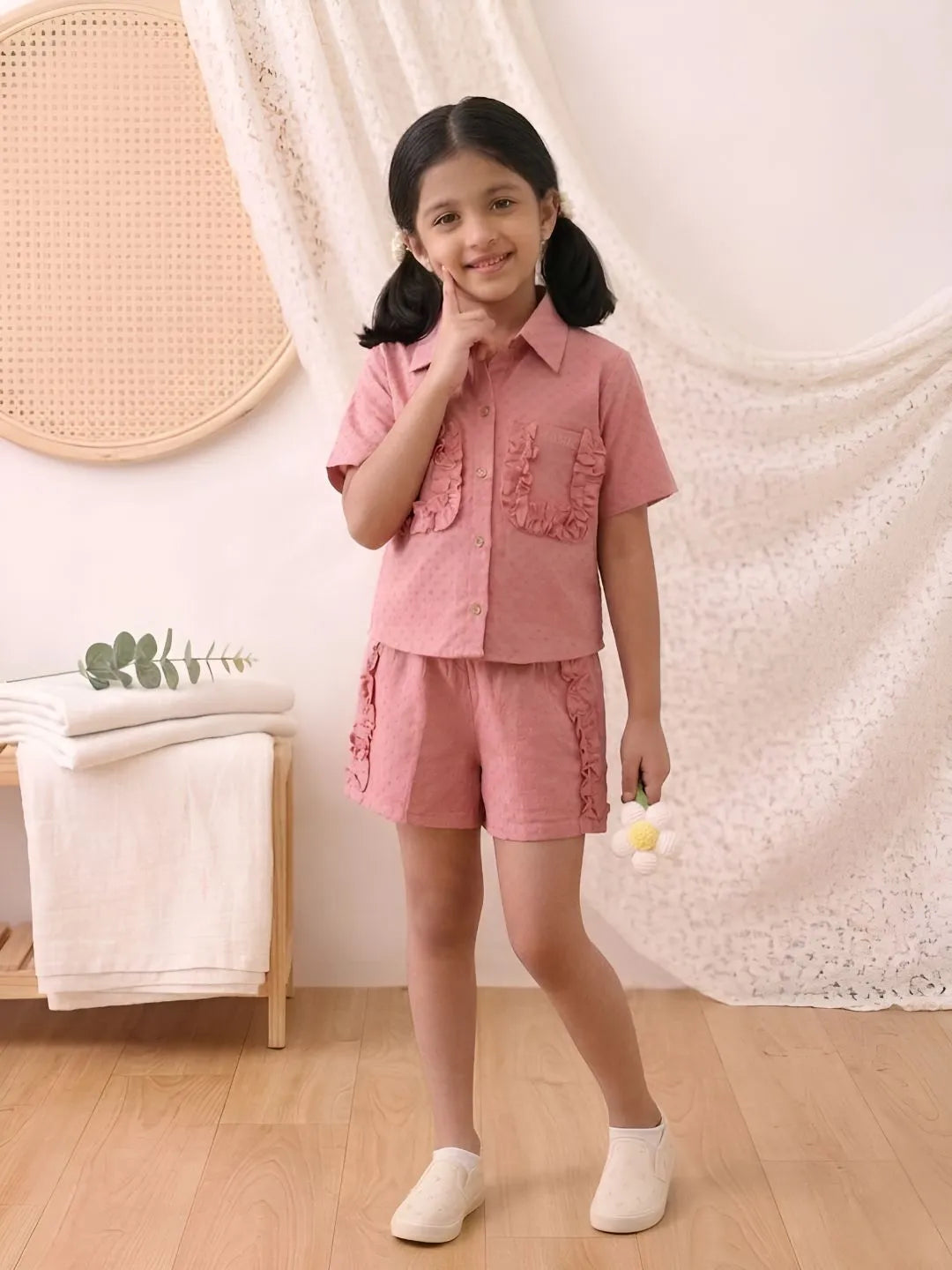 Trendy girls shirt and shorts co-ord set front pose
