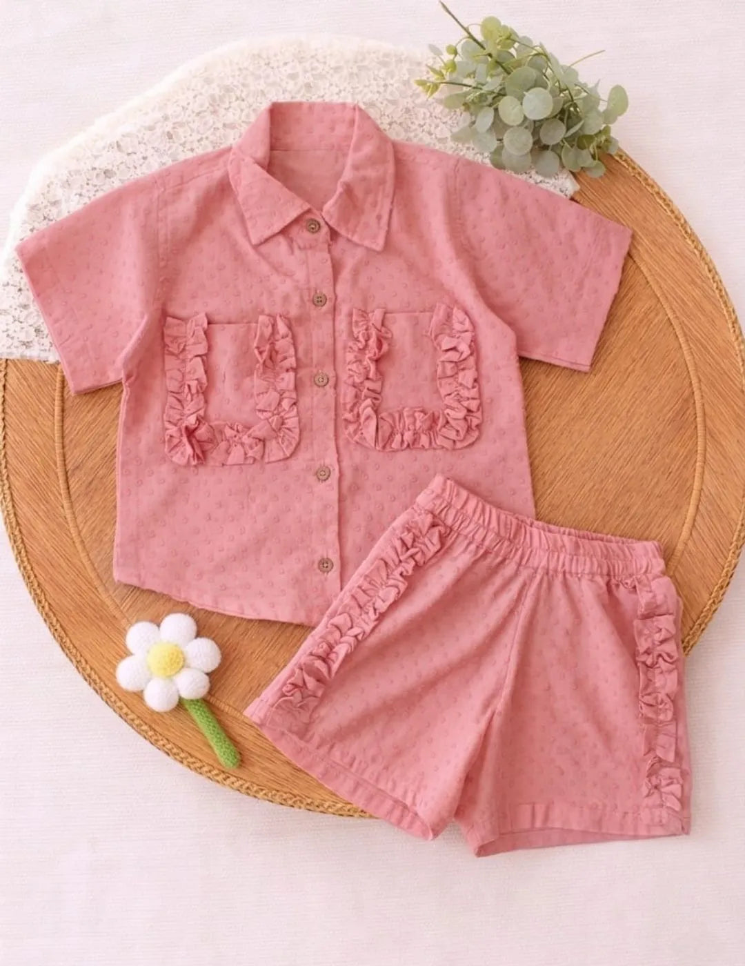 Girls shirt and shorts co-ord set flat lay clothing image