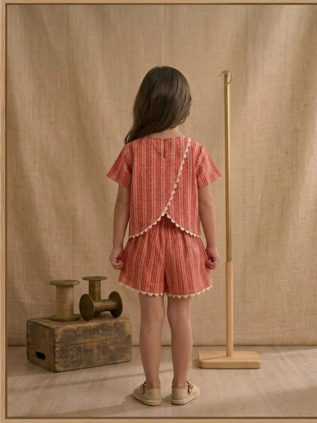 Back view of girls coral stripe cotton co-ord set with comfortable fit