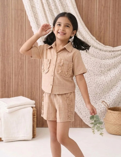Stylish girls co-ord set front look with ruffle pocket detailing