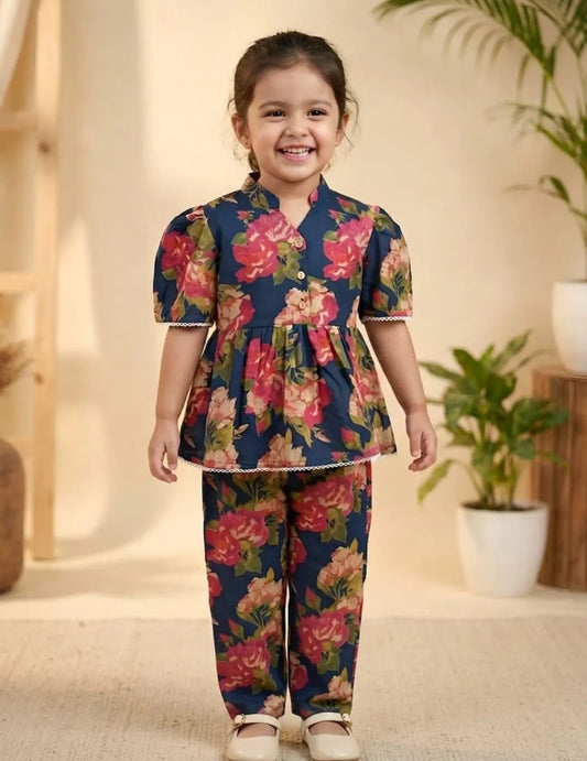 girl wearing floral cotton co-ord set front view printed top and pants outfit