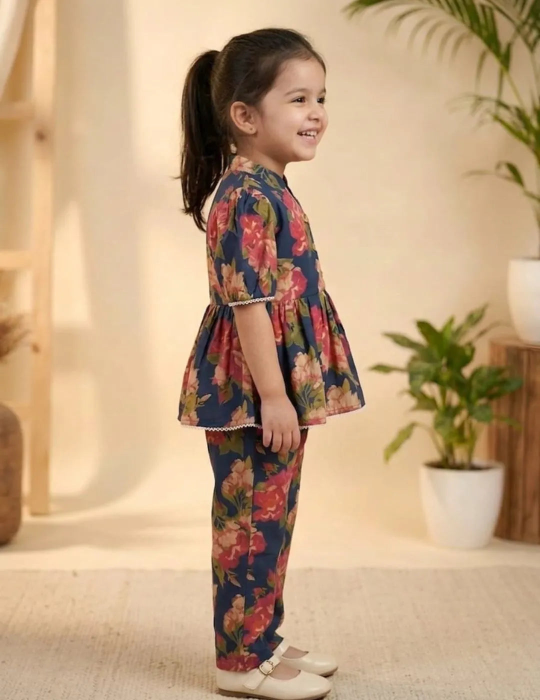 side view of girls floral cotton co-ord set printed outfit with relaxed fit