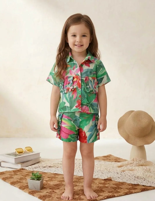 girl wearing tropical floral cotton co-ord set front view shirt and shorts