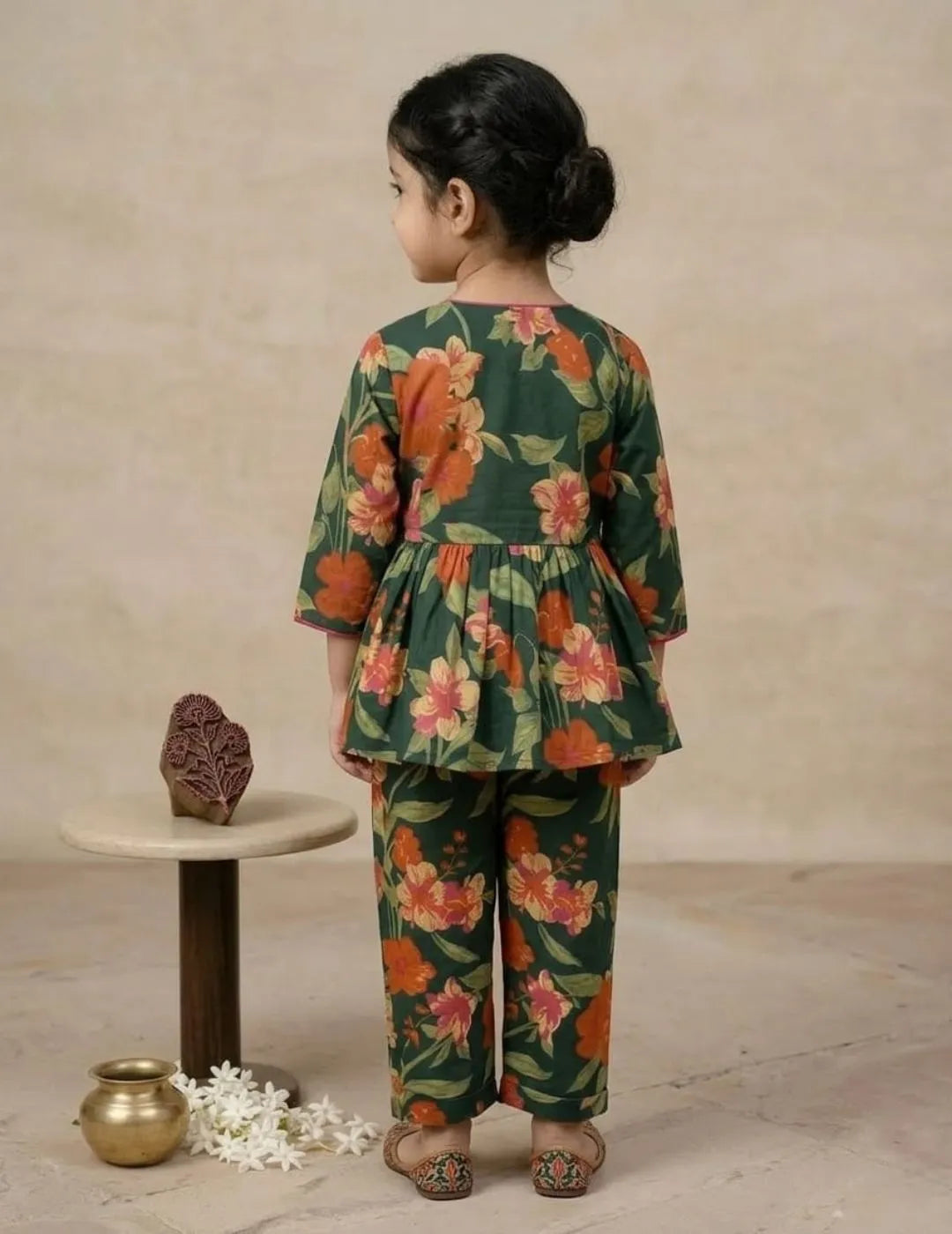 back view of girls green floral co-ord set top and pants outfit